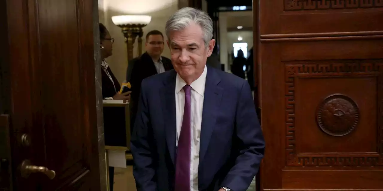 Federal Reserve officials back moving interest rates higher in order to slow the economy, minutes show