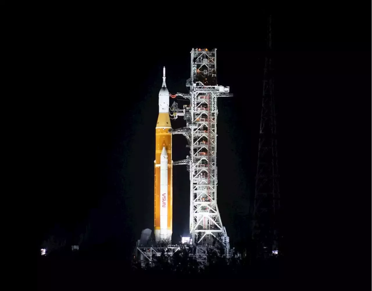 NASA’s Artemis I Mega Moon Rocket Begins Roll To Launch Pad