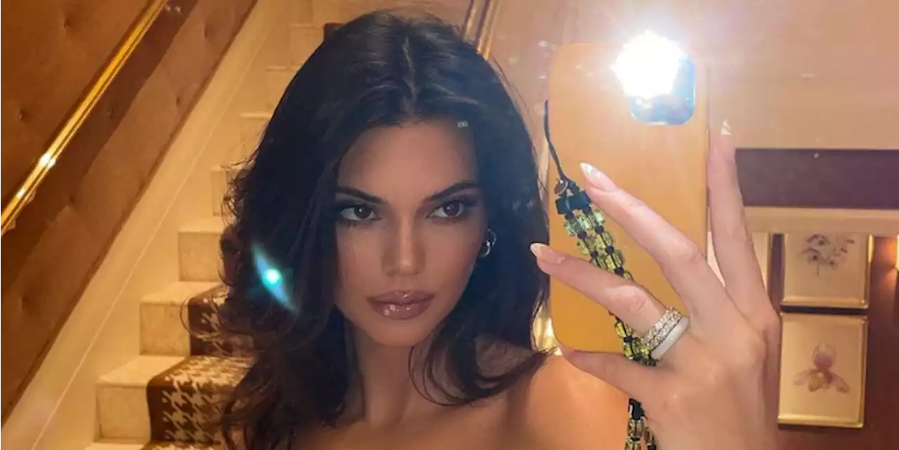 Kendall Jenner Is a Bronzed Beauty in a Brown String Bikini and Baseball Cap