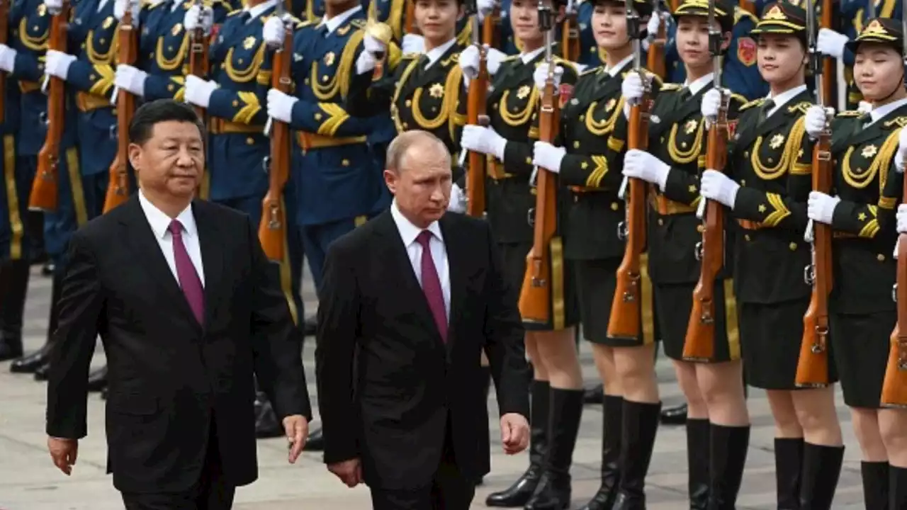 China pouring thousands of troops into Russia