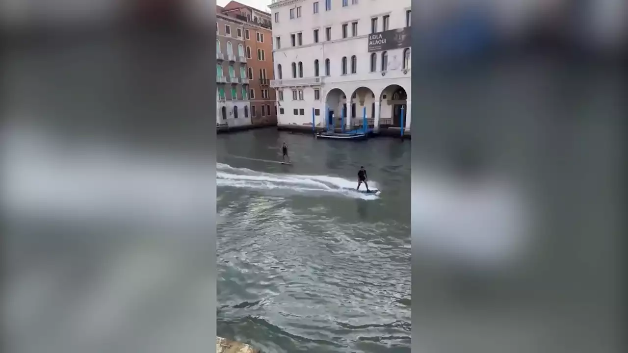 Venice, Italy fines Australian tourists for motorized surf board ride through city