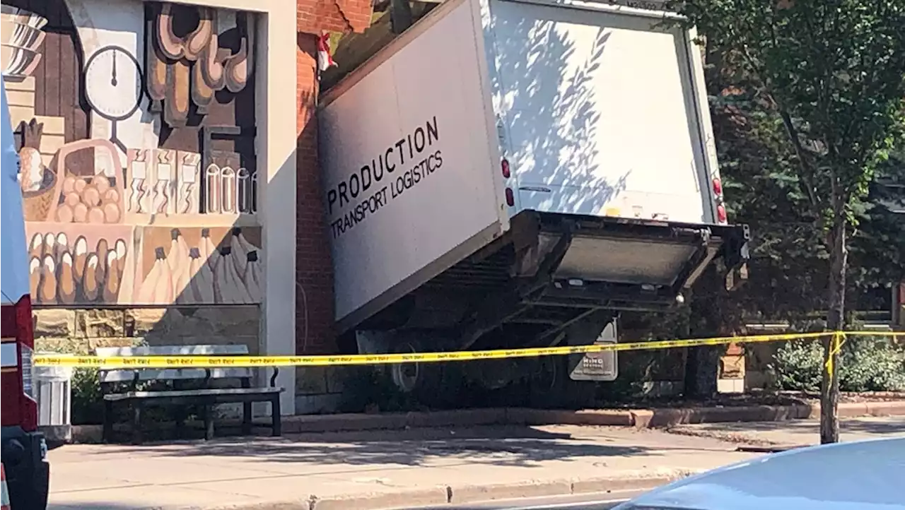 3 store employees hurt after truck crashes into Calgary Co-op