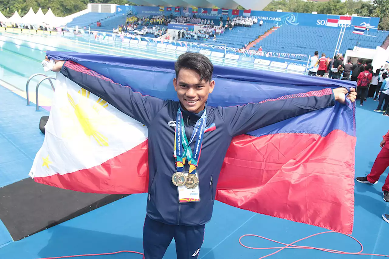 Rookie swimmer Alegarbes splashes to record-breaking golden double in Para Games - BusinessWorld Online