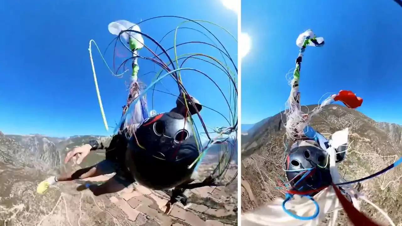 Heart-stopping moment paraglider narrowly avoids death 'one second' before crashing into ground