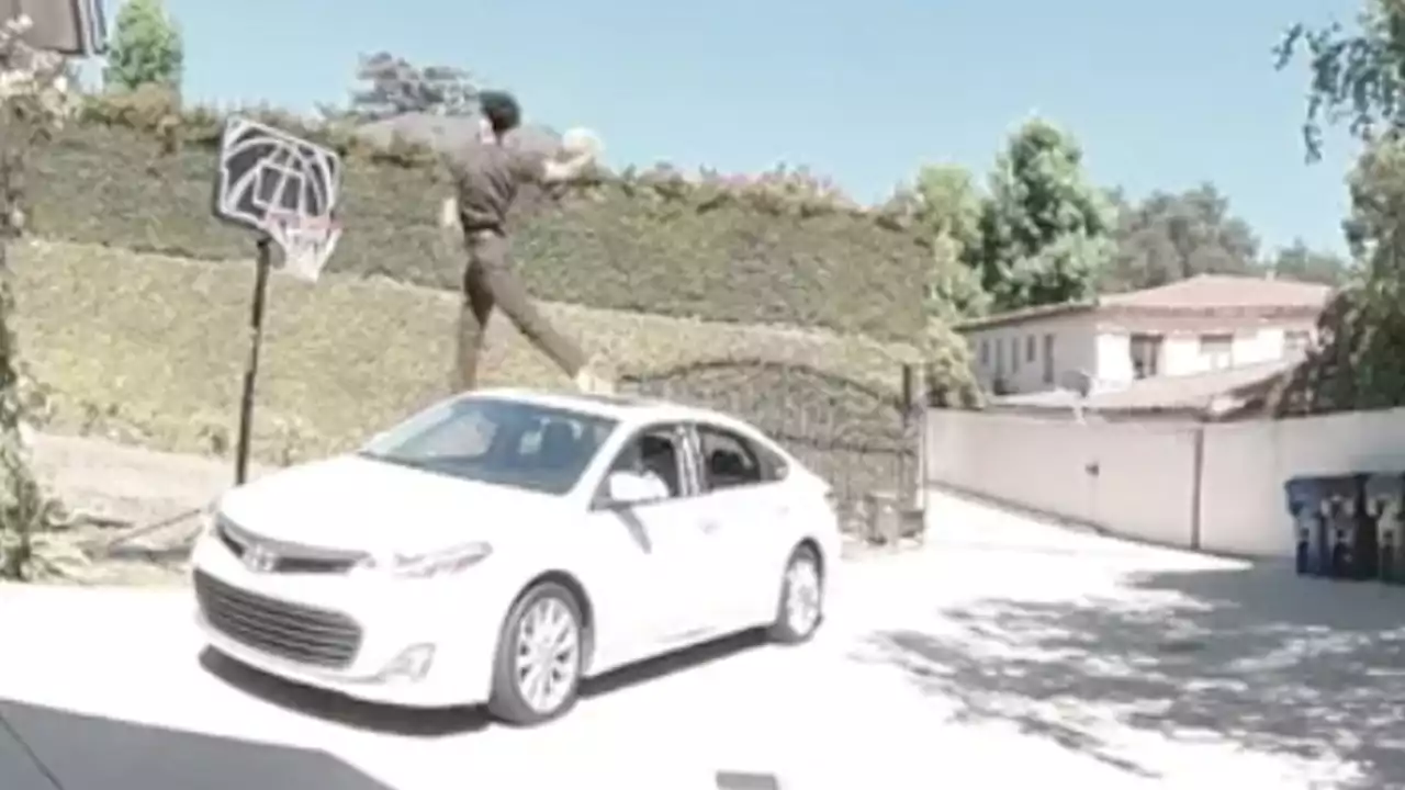 Does Video Really Show a UPS Driver Dunking Over a Car?