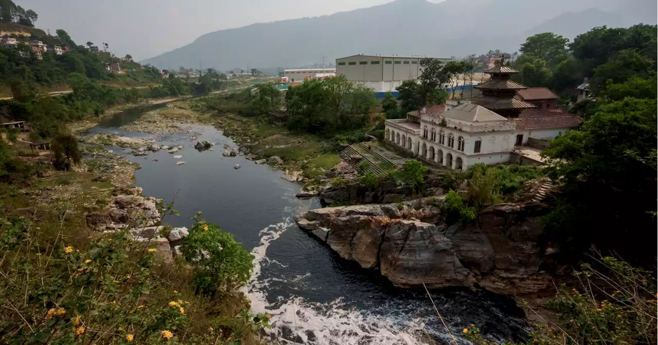 Nepal's holy Bagmati River choked with black sewage, trash