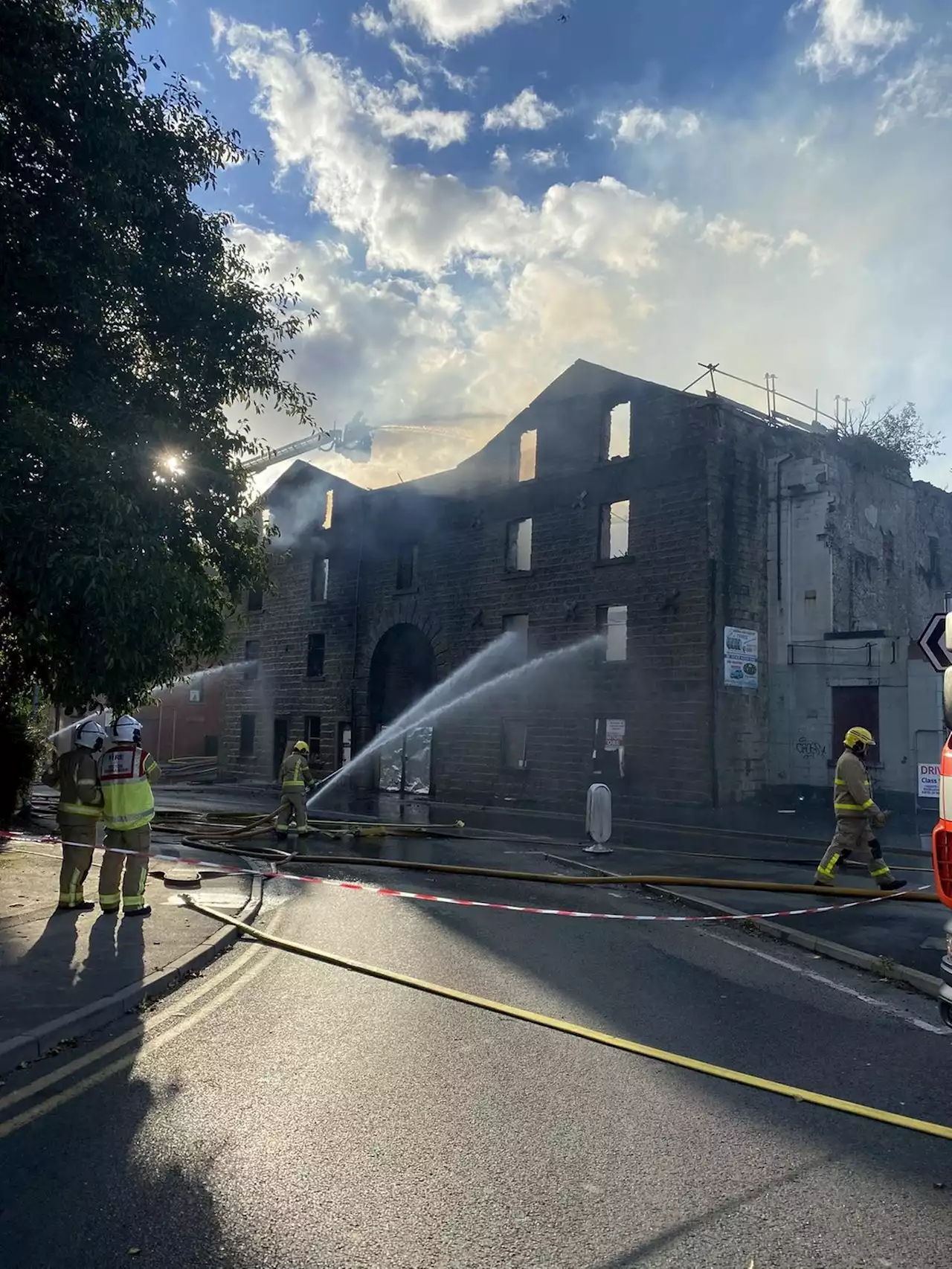 Roads shut to traffic as firefighters tackle major Lancashire mill blaze