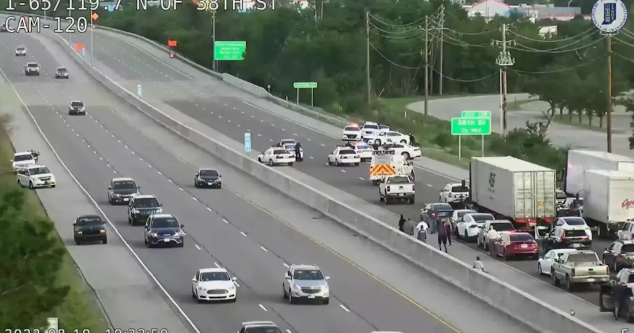 Woman arrested after pursuit, standoff on I-65 in Indianapolis