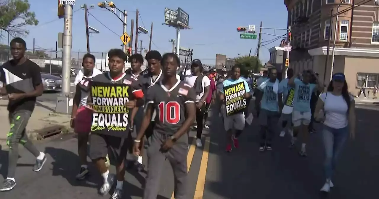 Newark residents take to the street for 13-mile peace walk