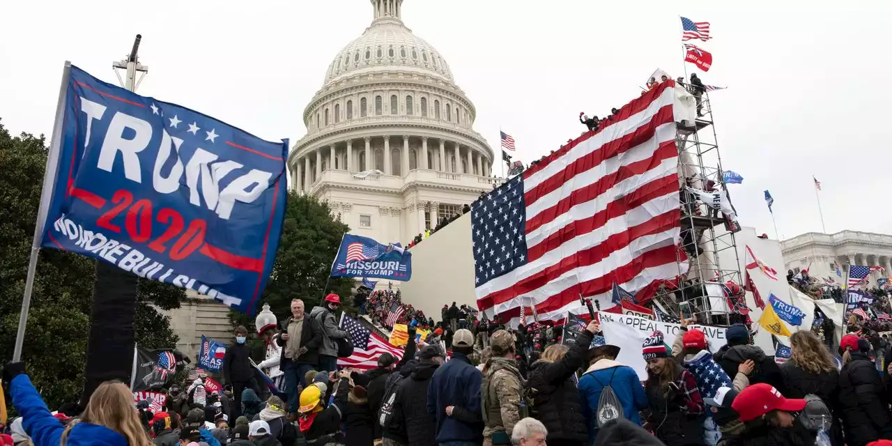 Americans see threat to democracy as No. 1 issue, support Trump probe, poll finds