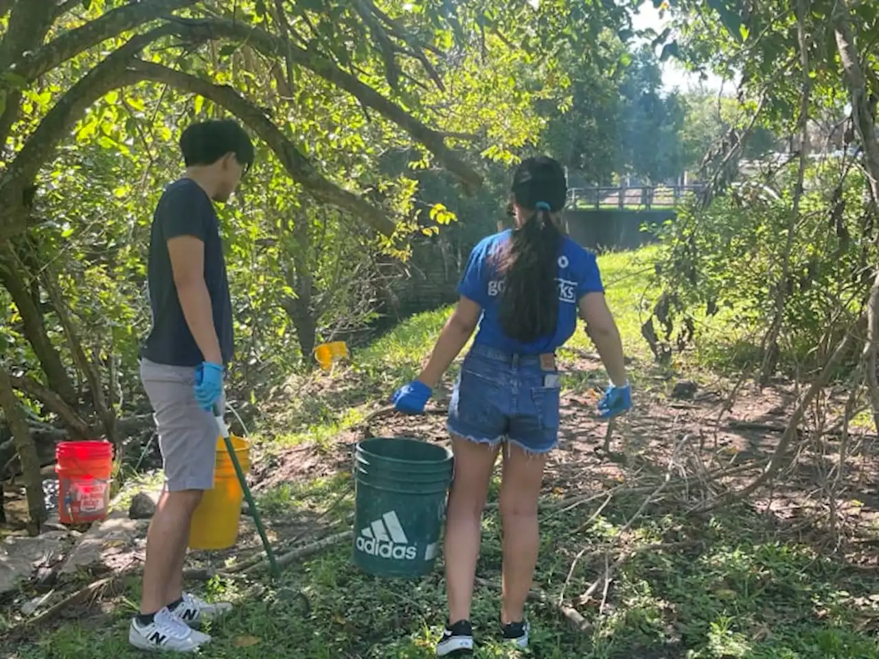 Volunteers participate in timely cleanup of Hogans Creek after recent flooding