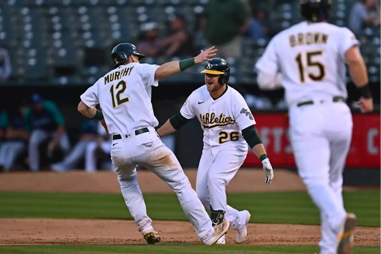 A’s break long skid against Mariners with win in 10th