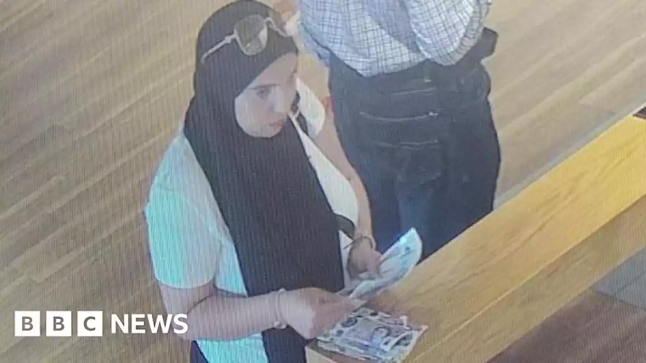 Woman sought over cash theft from Leicester shop