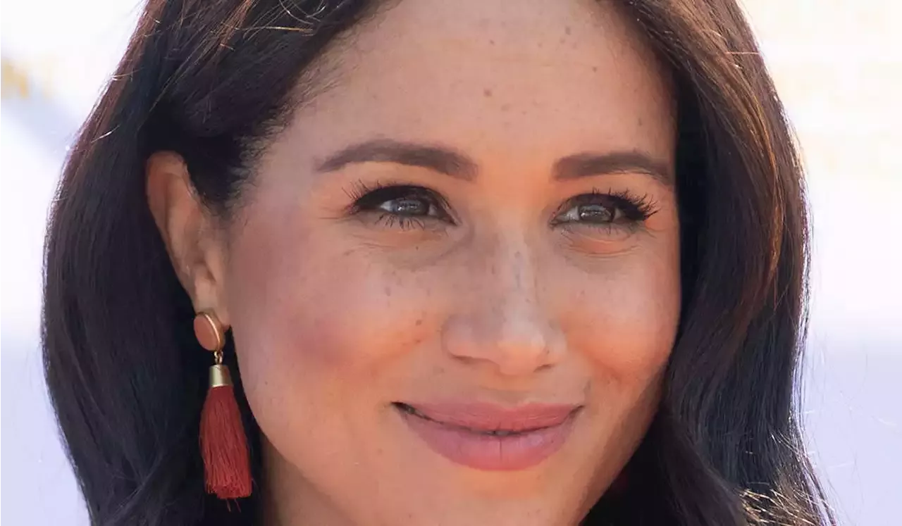 Meghan Markle reappears with her natural curly hair – and Doria and Archie  are all smiles