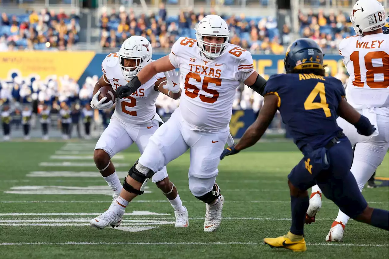 Jake Majors, Christian Jones working to get young Texas O-linemen on the same page