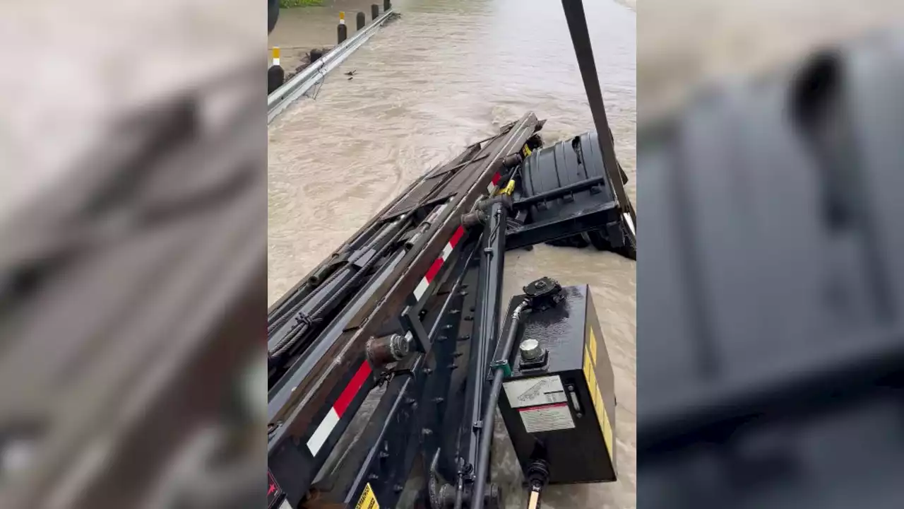 VIDEO: Floodwaters destroy bridge as truck crosses