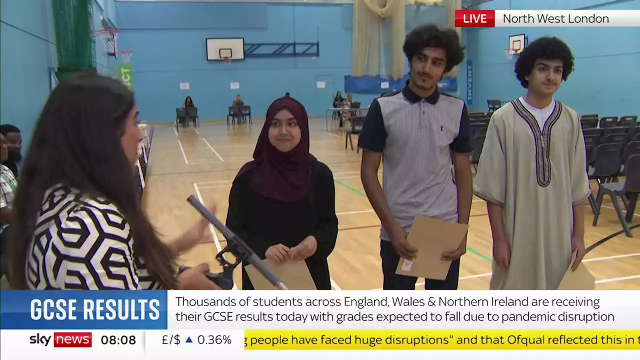 GCSE results live: Pupils opening results are told by minister that lower grades 'part of the plan'