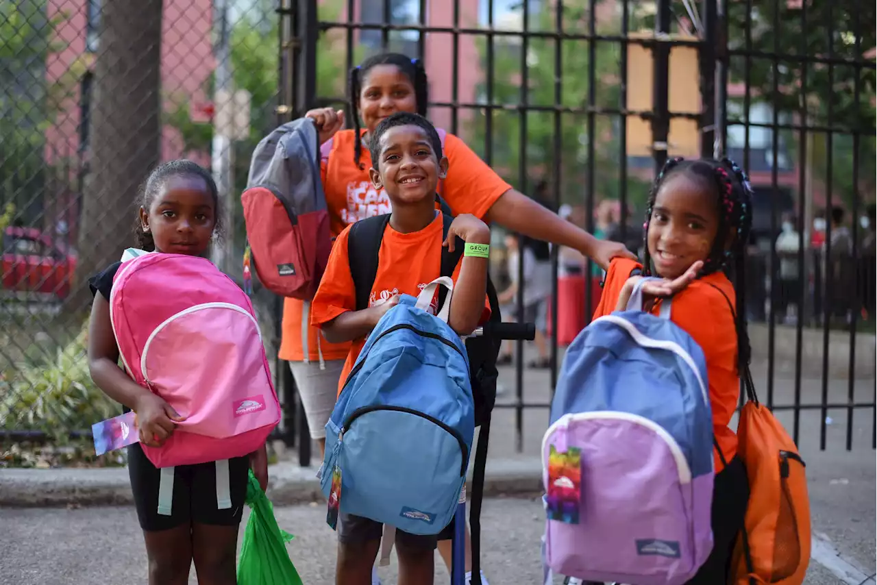 New York Cares backpacks with school supplies at Henry Street Settlement - New York Amsterdam News