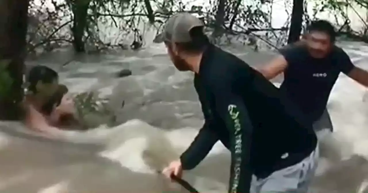 Heart-stopping video shows bus driver using seat belts tied together to save kids during flood