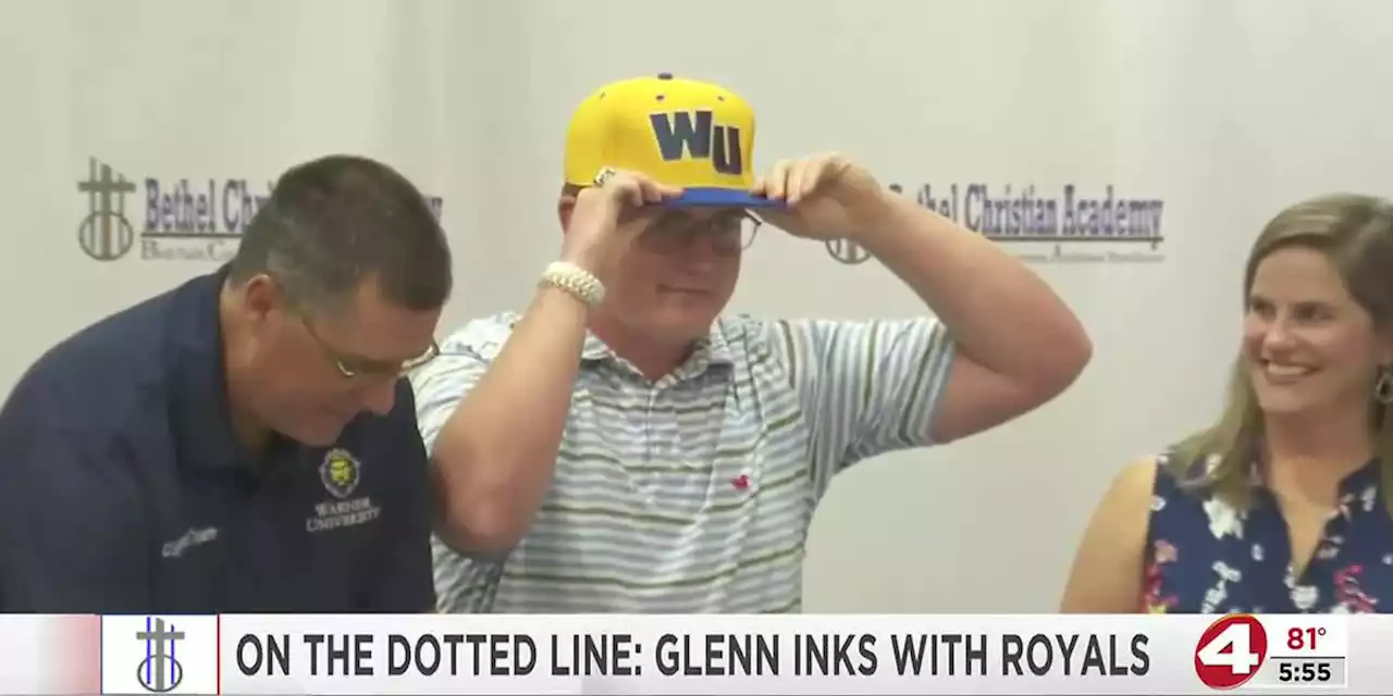 On the dotted line: Adam Glenn signs with Warner