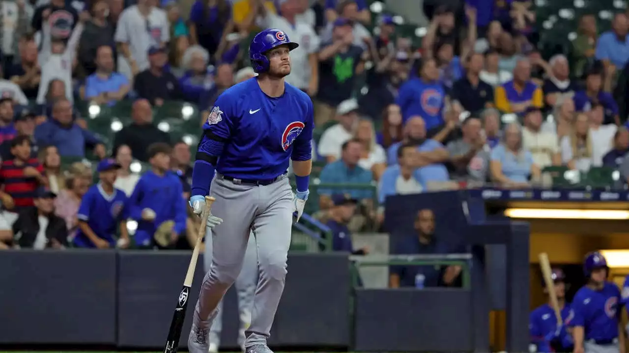 Happ’s homers help Cubs defeat Brewers 4-3 in 10 innings