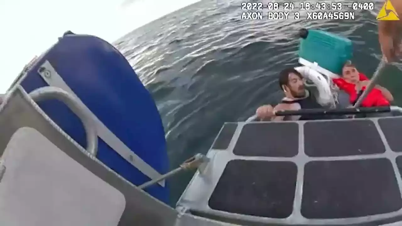 WATCH: Father, Son Clinging to Cooler Rescued After Boat Sinks in Boston Harbor