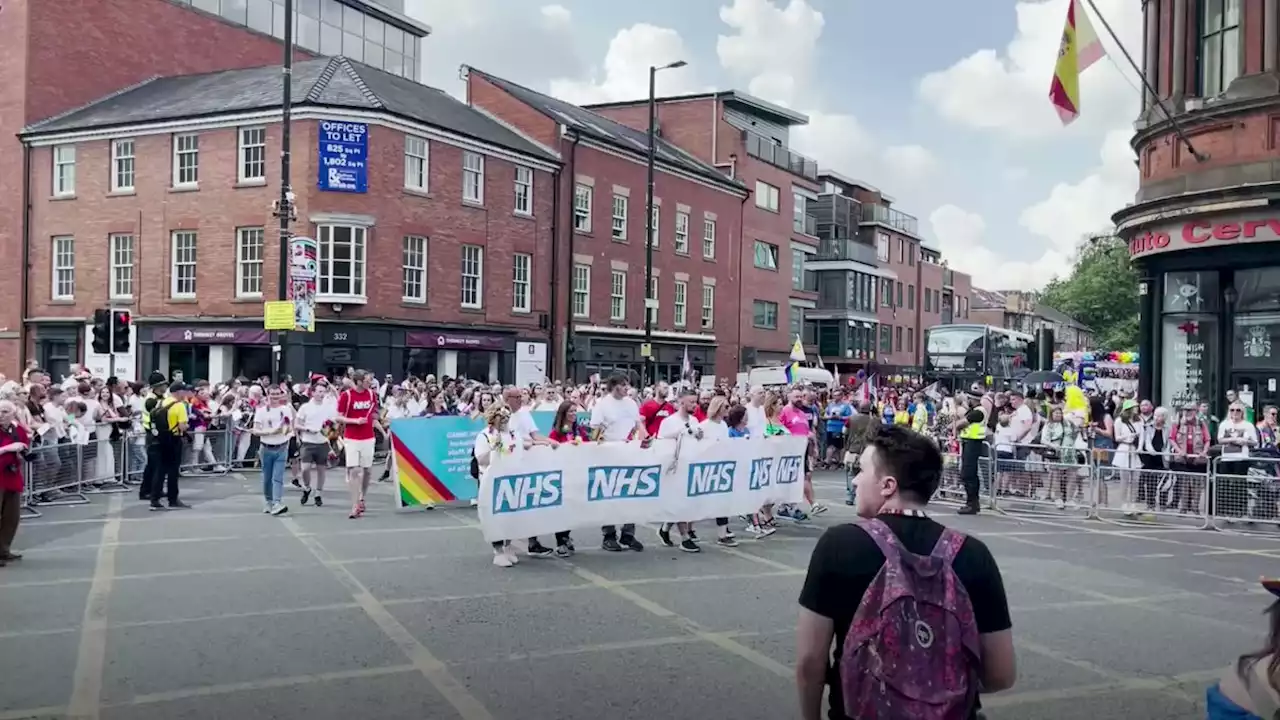 Huge applause as NHS and ambulance workers take to the Manchester Pride parade