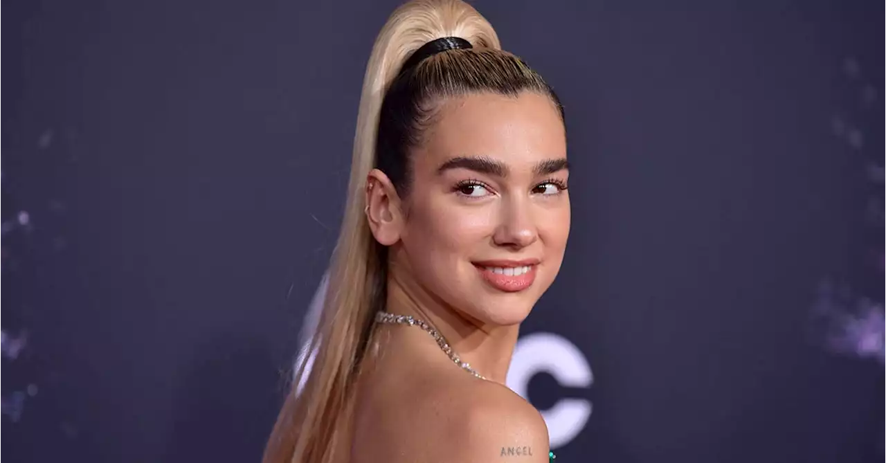 Dua Lipa Wore a Sheer White Dress to a Wedding