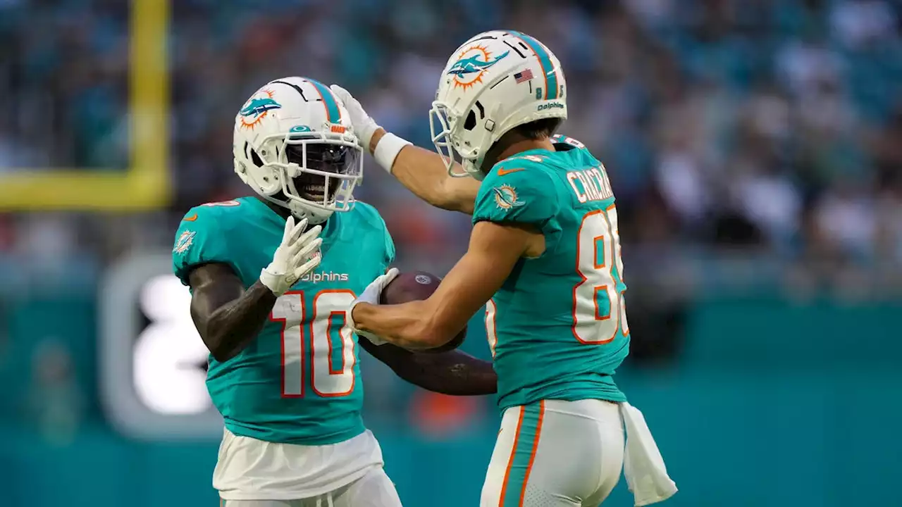 Dolphins pay tribute to late executive with Tua Tagovailoa's deep pass to Tyreek Hill in preseason win