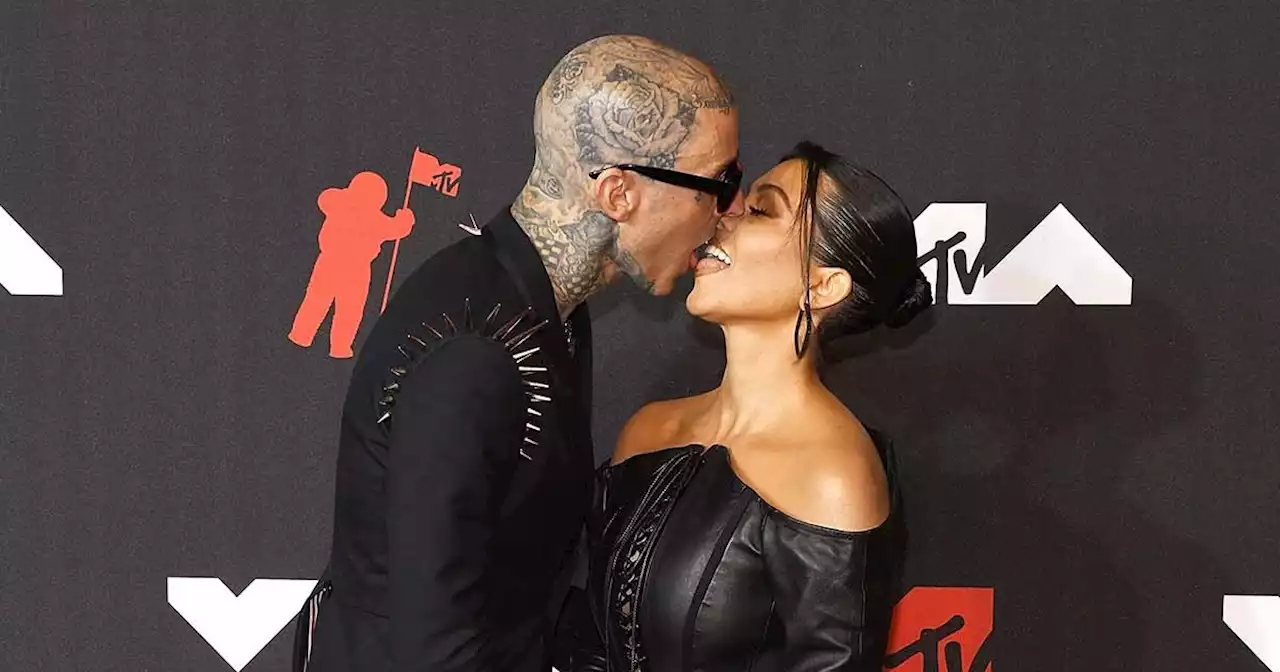 Kourtney Kardashian, Travis Barker and More Couples' VMAs PDA Through the Years