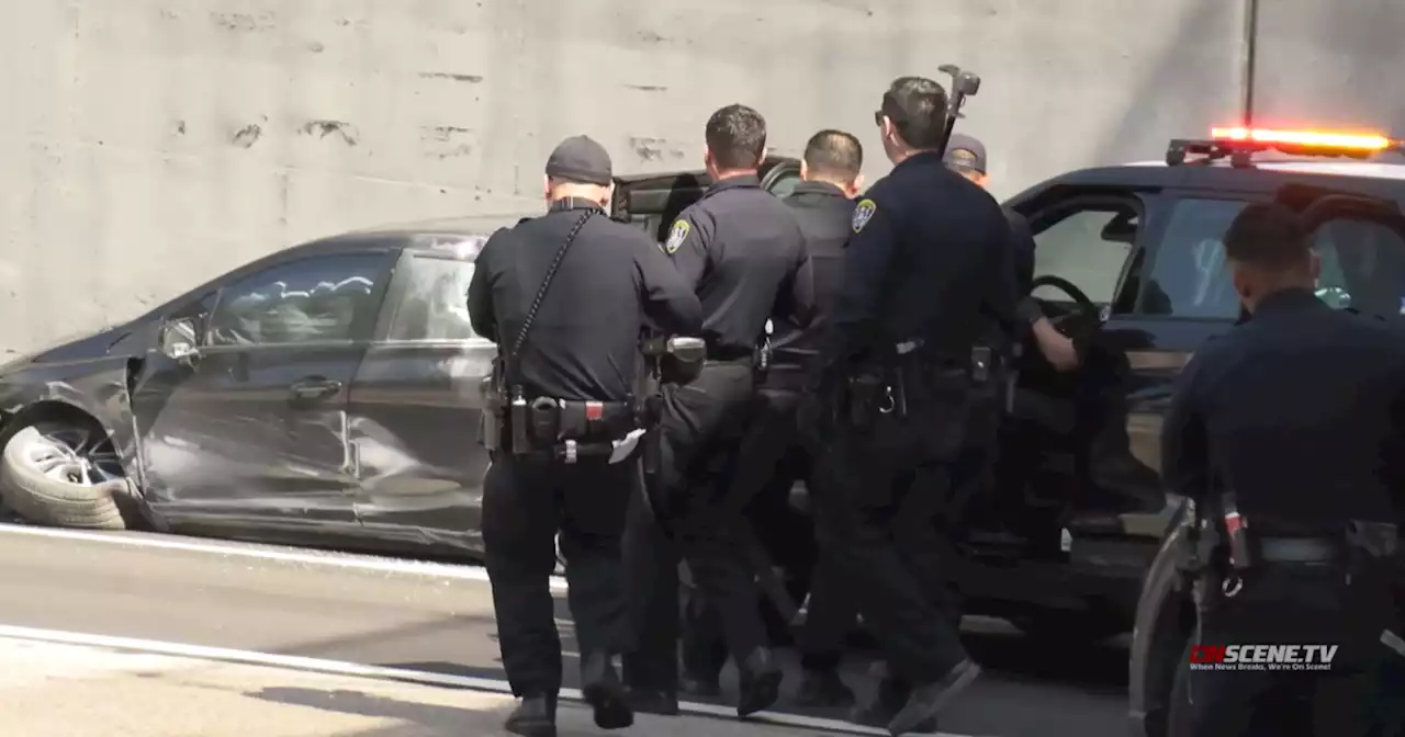 Driver leads police on pursuit, is arrested after brief freeway standoff