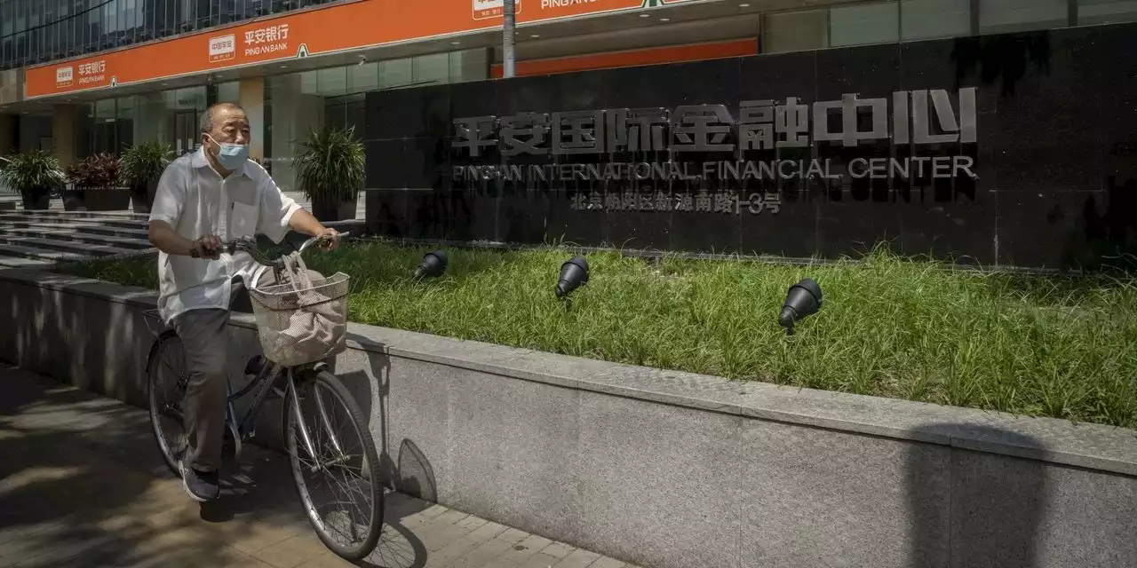 China’s Property Slowdown Sends Bank Shares Tumbling