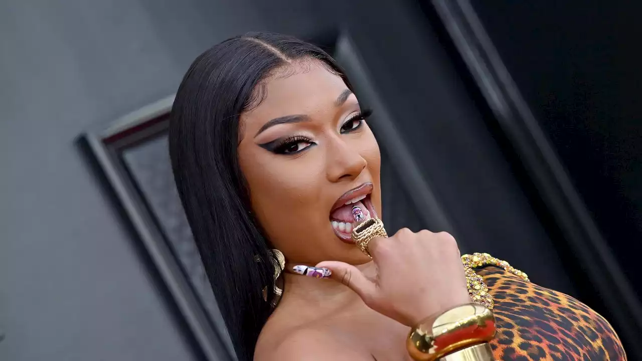 Megan Thee Stallion’s New Purple Bangs Are Extra Clean