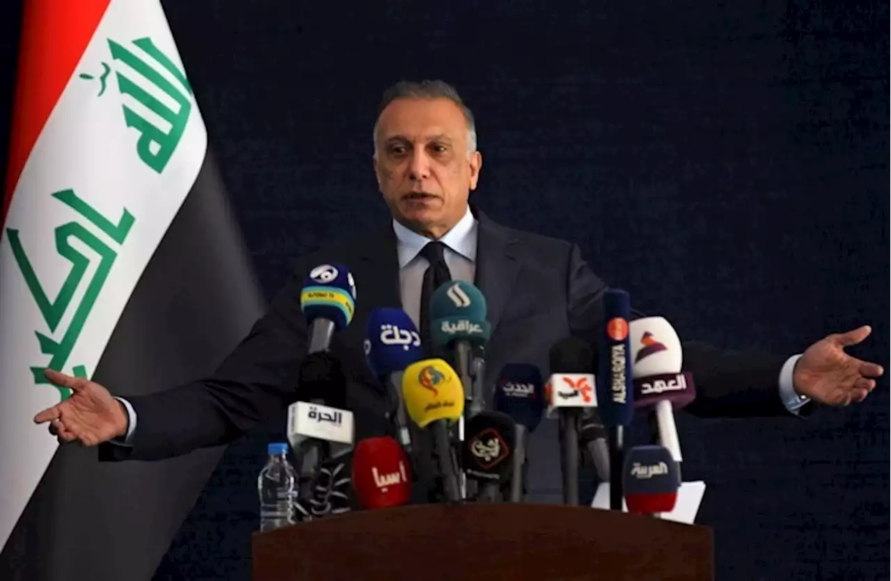 رئيس العراق يدعو لانتخابات مبكرة والكاظمي يلمح لإخلاء منصبه
