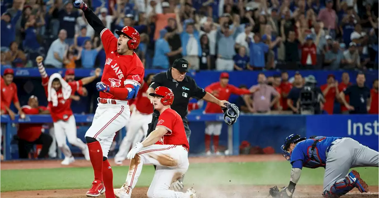 Jansen Drives in 4, Jays Beat Cubs