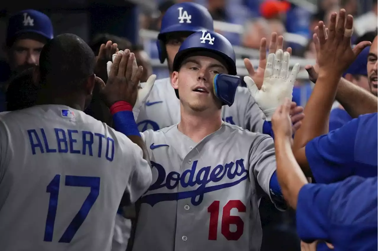 Dodgers need extra innings to put away Marlins again