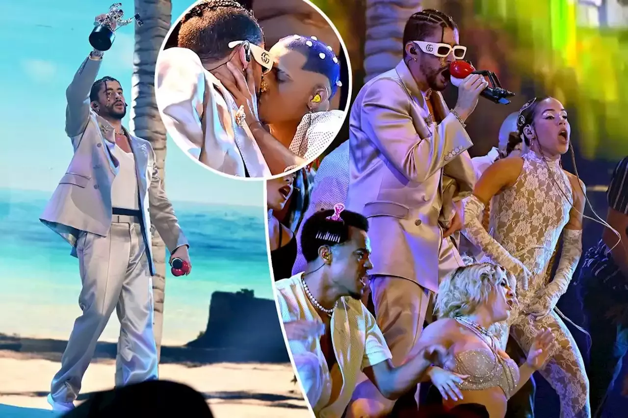 Bad Bunny kisses male backup dancer during MTV VMAs 2022 performance