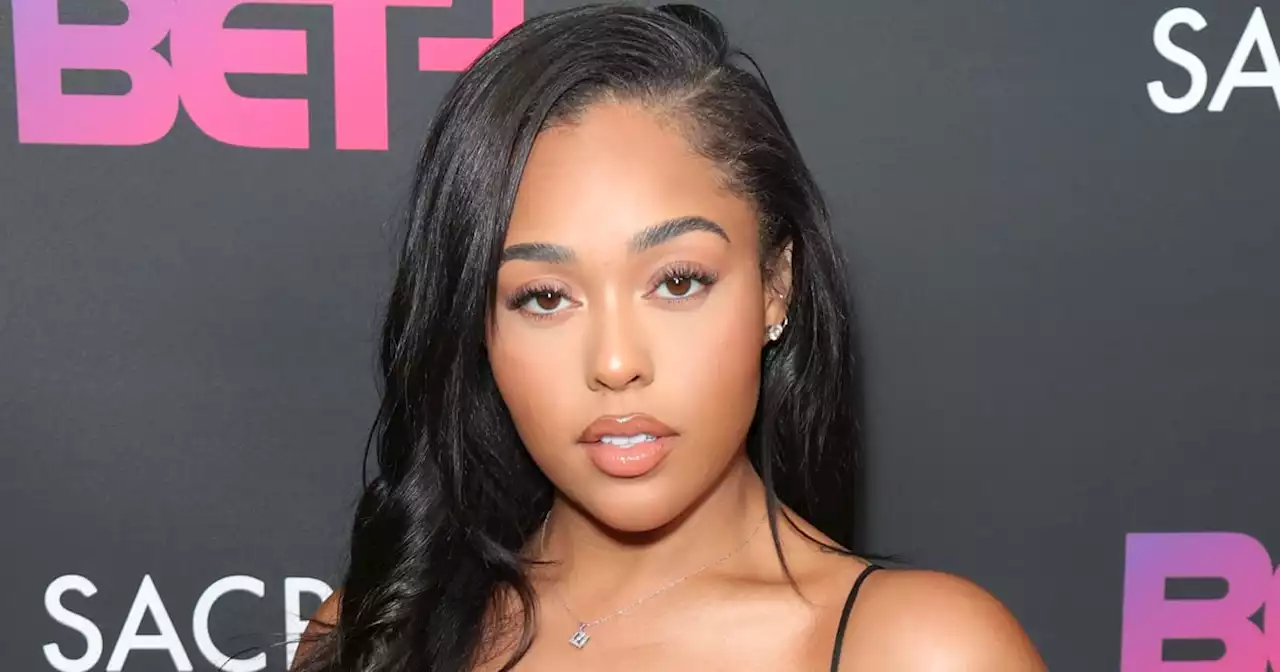 Jordyn Woods Enjoys a Tropical Vacation in a Crochet Bikini and Cozy Cover-Up