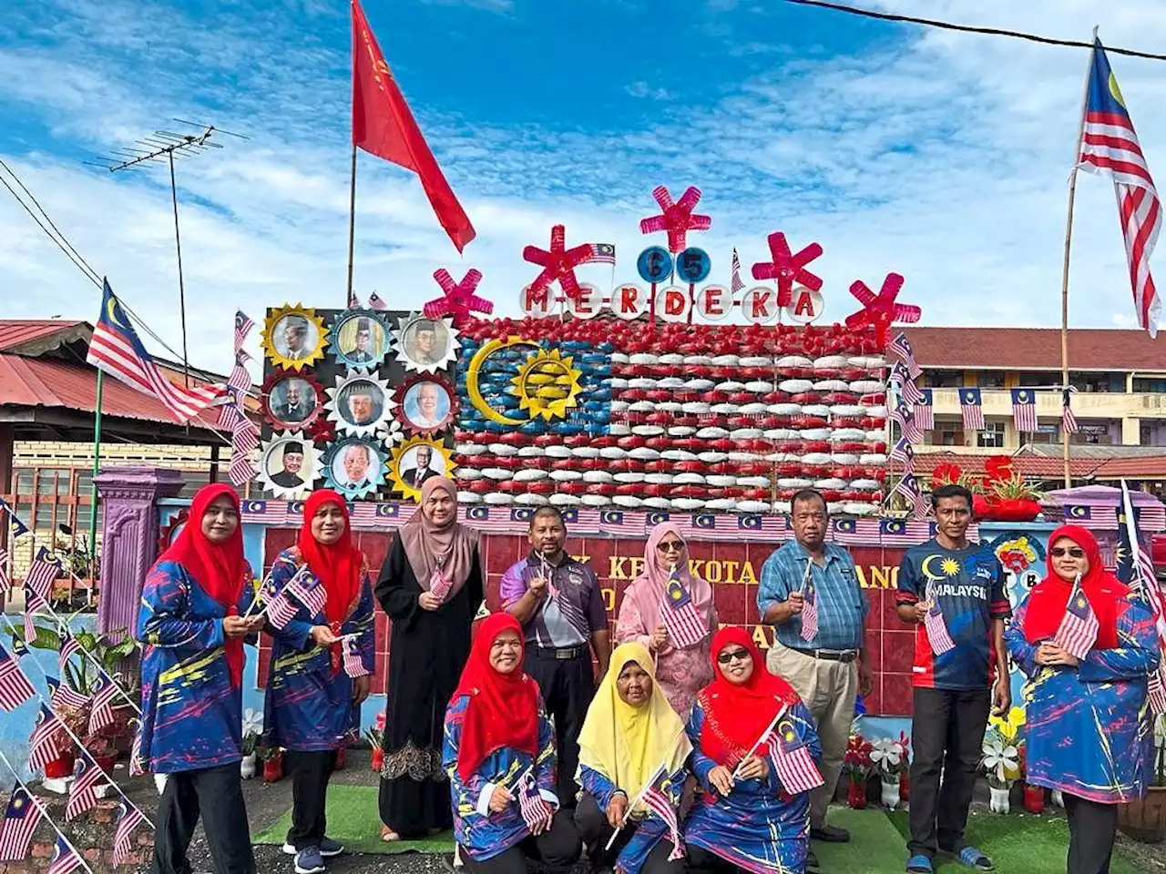 Parents upcycle a patriotic display at Kedah school