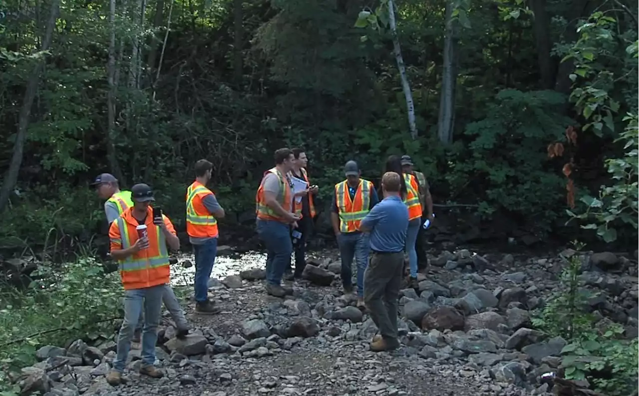 Contractors pay a visit to the failed McVicar Creek culvert