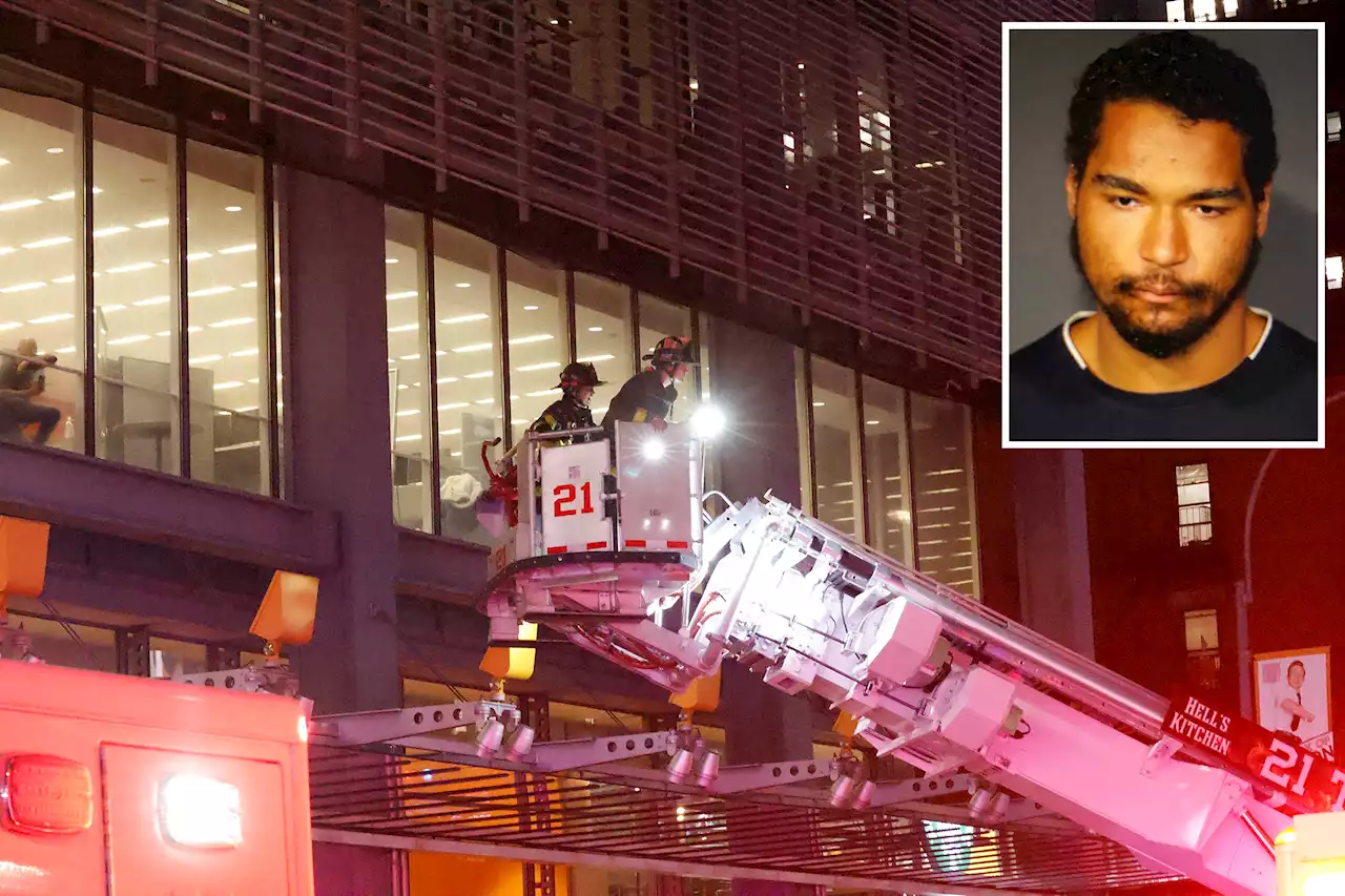 Man scales New York Times building, holds knife up to throat