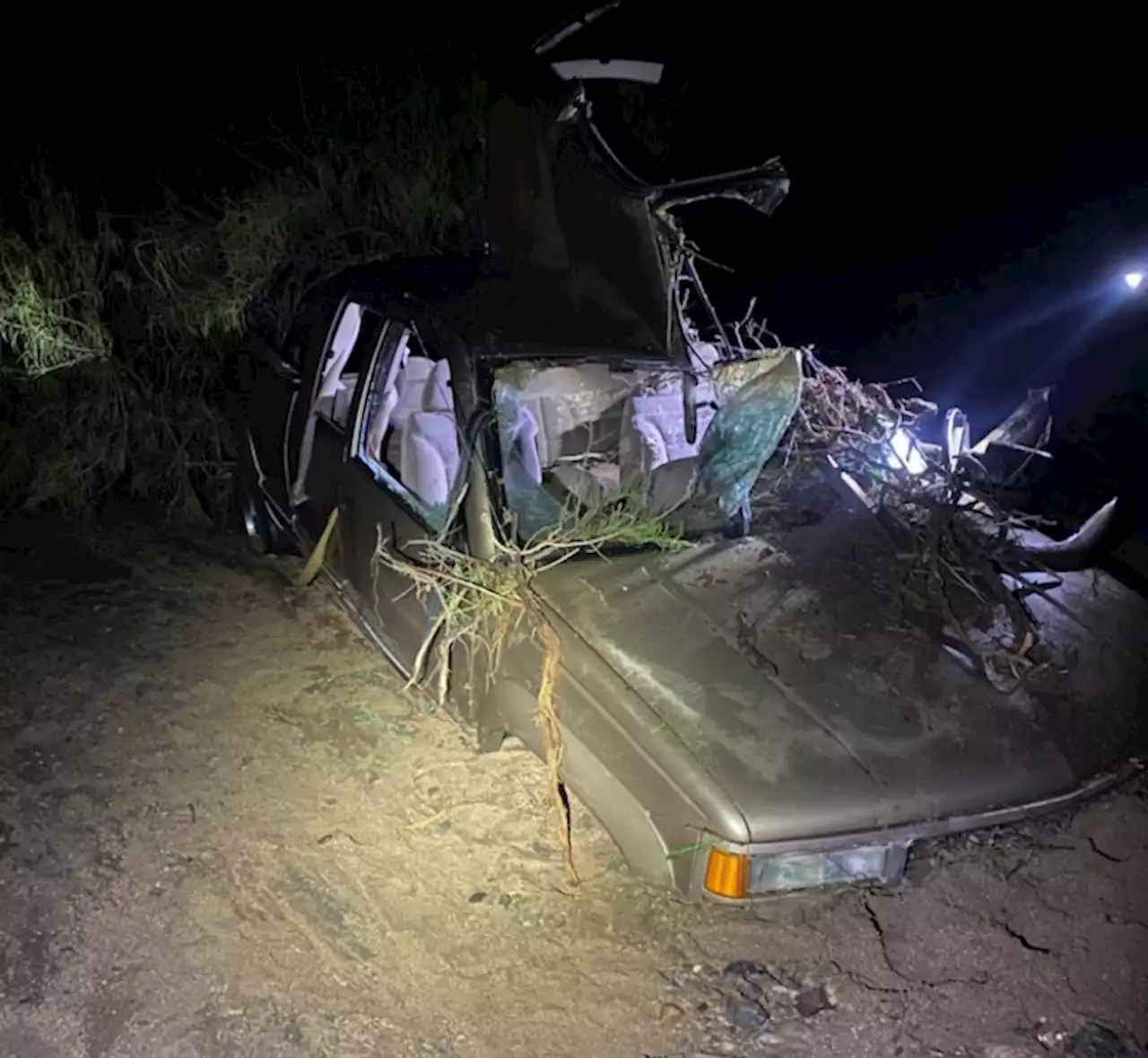 Man dead after truck found swept in floodwaters near Kingman