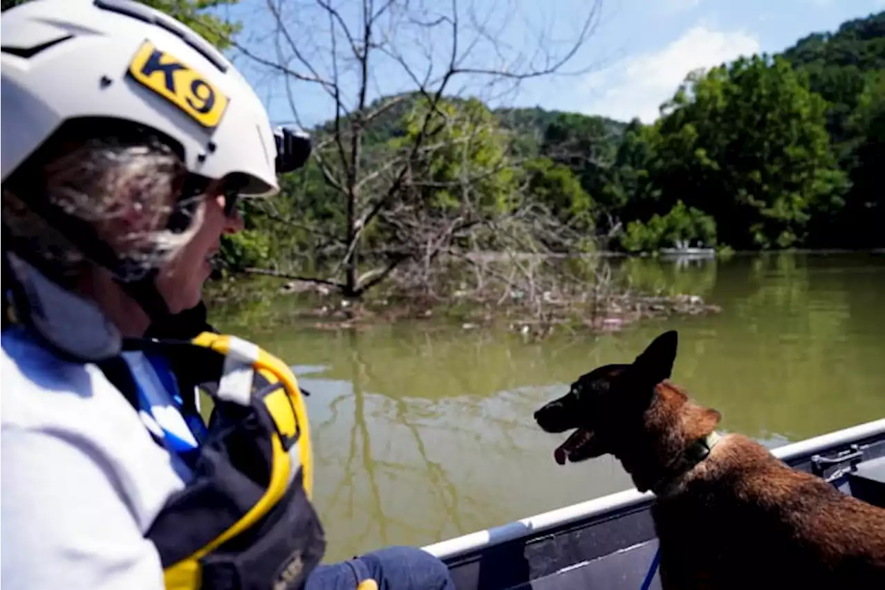 Long days grind on search teams in flood-ravaged Appalachia