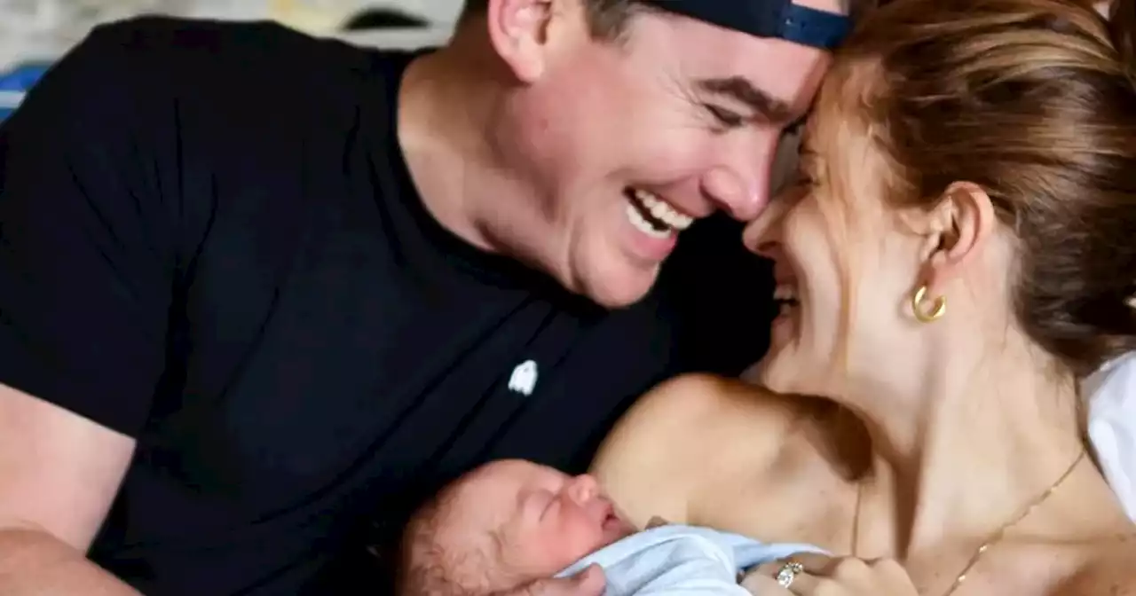 Watch the emotional reaction of a dad holding his newborn for the first time