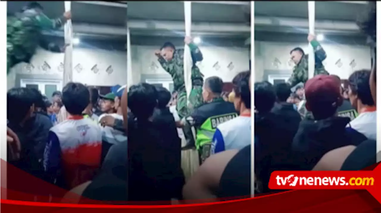 Viral Video Aksi Heroik Anggota TNI Loncat dan Hinggap di Tiang Pisahkan Keributan , Tuai Komentar Netizen