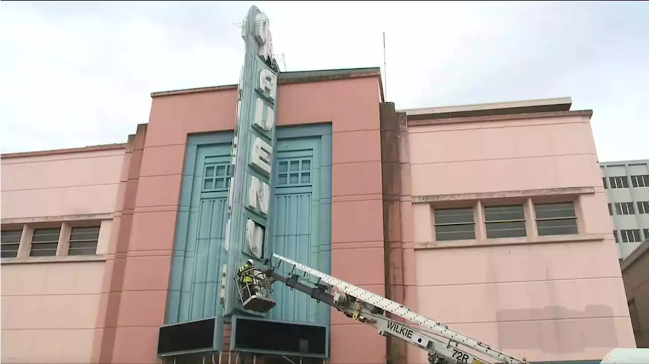 Work begins on taking down iconic Fourth Avenue Theatre sign in downtown Anchorage