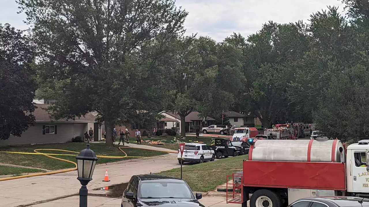 Patrol: 4 found dead in 2 burning homes in Nebraska city