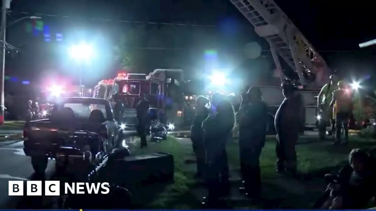 US fireman finds 10 dead in house blaze are his family