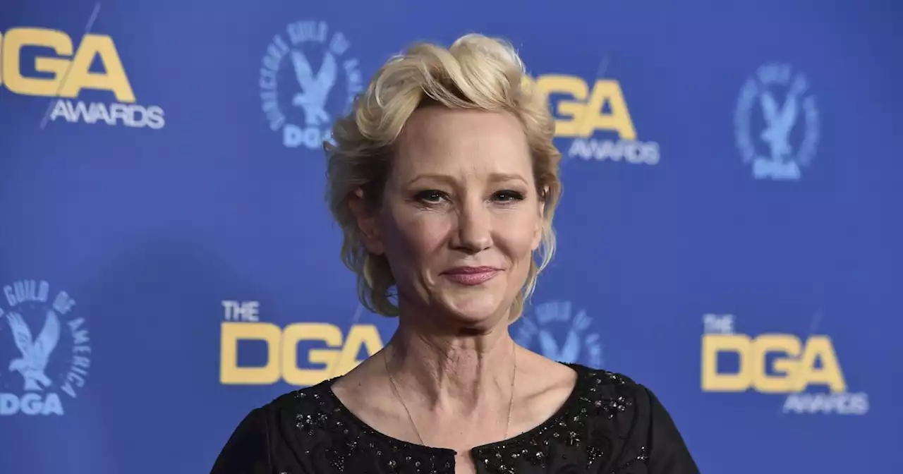 Actress Anne Heche hospitalized after car crash