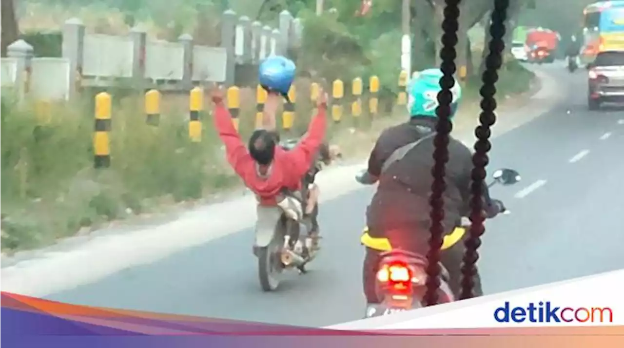 Viral Aksi Akrobatik Biker Bawa Motor Sambil Tiduran di Pasuruan